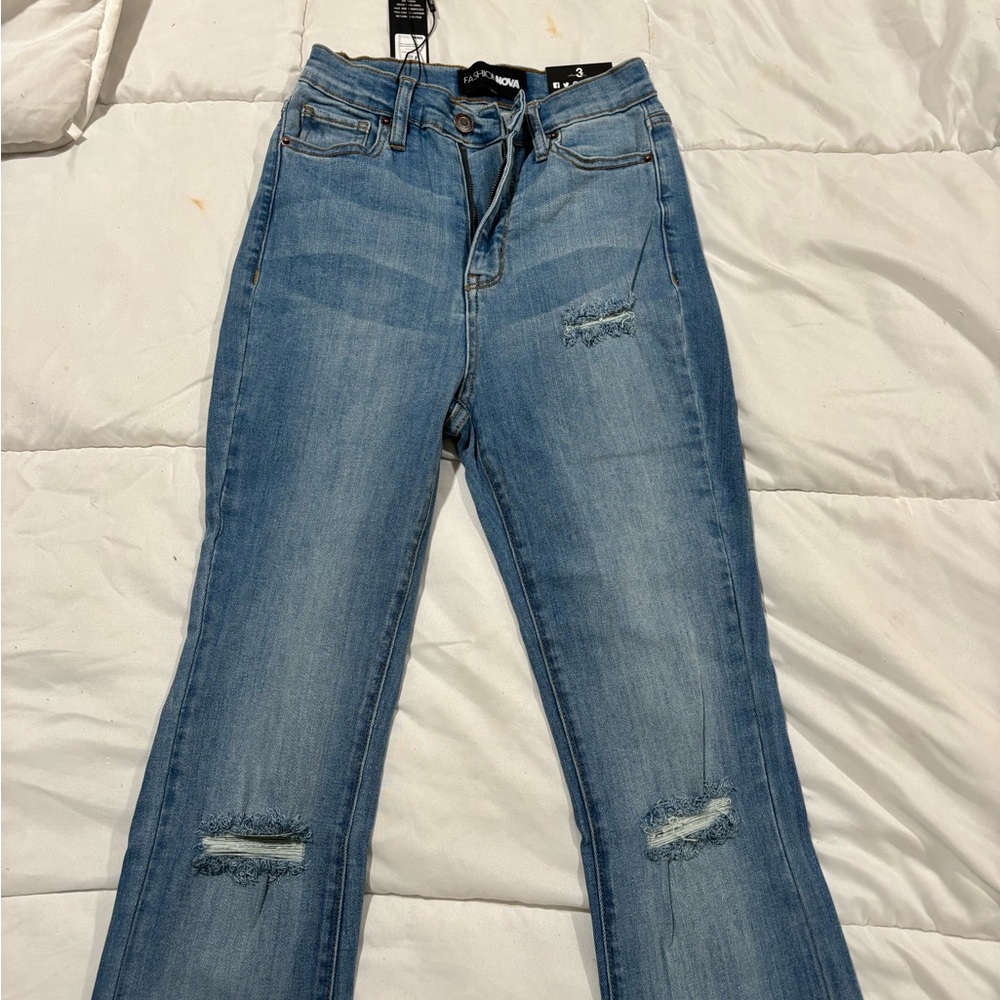 Fashion Nova Blue Straight Leg Jeans with Distressed Knees